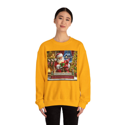 Even Santa Knows It’s the Giving That Matters Most  Christmas Giving-Themed Sweatshirt Unisex Heavy Blend Crewneck Sweatshirt