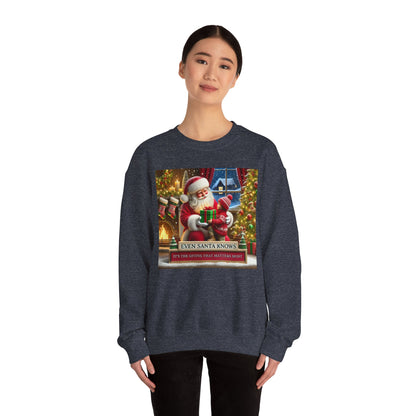 Even Santa Knows It’s the Giving That Matters Most  Christmas Giving-Themed Sweatshirt Unisex Heavy Blend Crewneck Sweatshirt